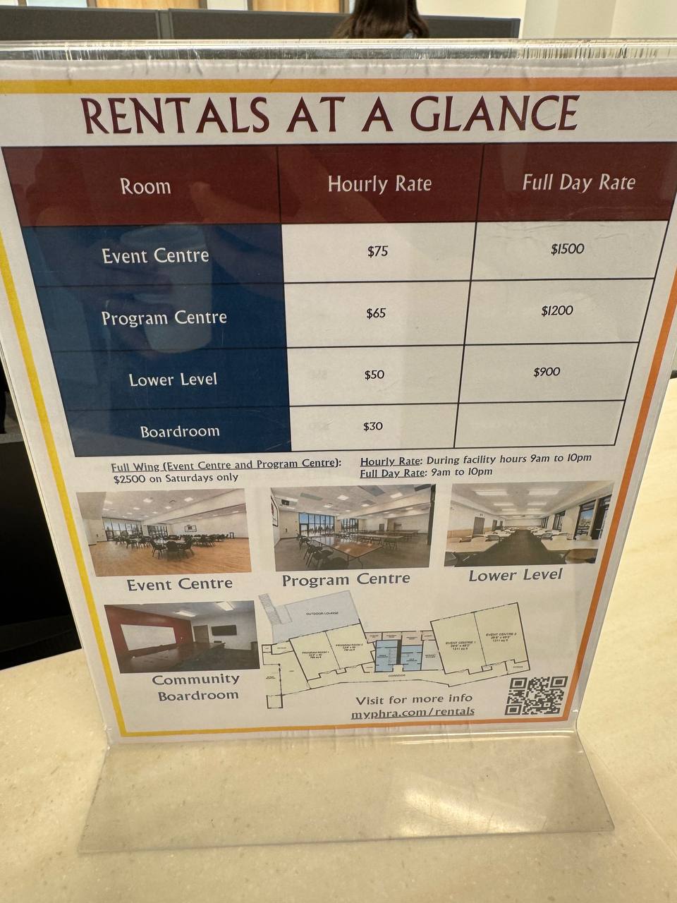 Rentals board inside Panorama Hills Community Centre showing room rates